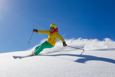 Switzerland, Graubuenden, Obersaxen, female Skier - EGF000021