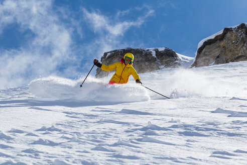 Switzerland, Graubuenden, Obersaxen, female Skier - EGF000023