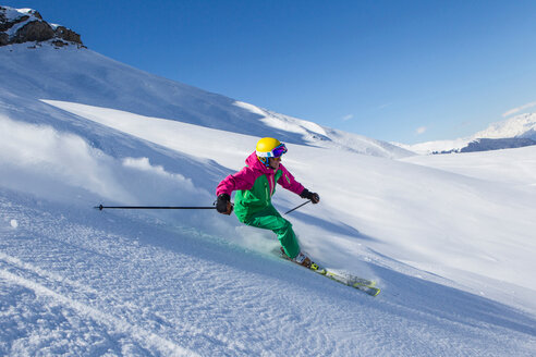 Switzerland, Graubuenden, Obersaxen, female Skier - EG000030