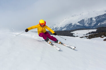 Switzerland, Graubuenden, Obersaxen, female Skier - EGF000040