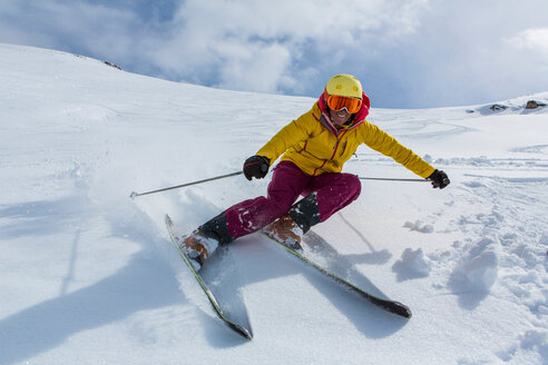 Switzerland, Graubuenden, Obersaxen, female Skier - EGF000043