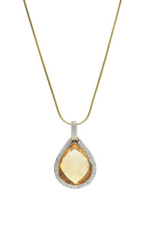 Pendant with large citrine gemstone framed with diamonds at gold necklace in front of white background - JAWF000011