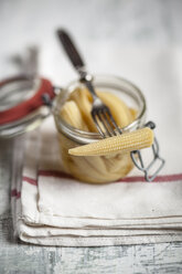 Pickled baby corn in preserving jar and fork - SBDF000615