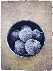 Lychees (Litchi chinensis) in bowl - MYF000169