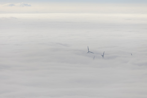 Germany, Baden-Wuerttemberg, Black Forest, wind turbines befogged stock photo