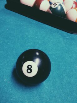 Billiard ball with black number 8 on pool table - MEAF000194