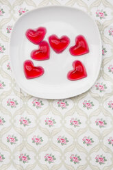 Plate of red hearts shaped of cherry jelly on cloth - LVF000793