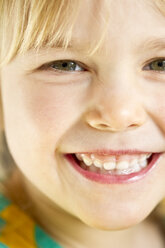 Portrait of little girl smiling, close-up - JFEF000301