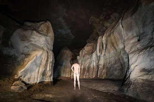 New Zealand, Crazy Paving Caves, Rear view of nude man - WV000466