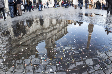 Italy, Rome, Piazza Navona, Church Sant Agnese in Agone reflecting in puddle - EJWF000352