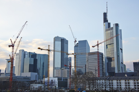 Germany, Hesse, Frankfurt, view to skyscrapers and construction cranes stock photo