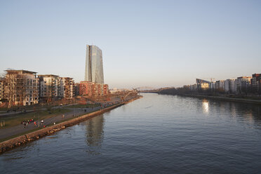 Germany, Hesse, Frankfurt, view to waterside of Main river and European Central Bank in the background - AKF000338