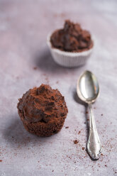 Two chocolate cup cakes and a tea spoon - MYF000236