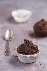 Two chocolate cup cakes and a tea spoon - MYF000238