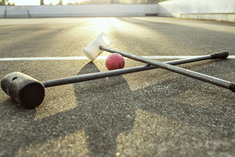 Germany, Hannover, Bike polo sticks lying on ground stock photo