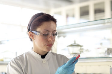 Young female scientist at work in lab - SGF000454