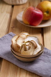 Apple chips in wooden bowl - MYF000266