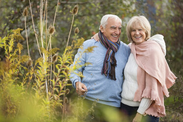 Portrait of happy senior couple having a walk - WESTF019199