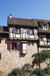 France, Alsace, Haut-Rhin, Riquewihr, Town wall with integrated houses - GW002713