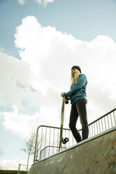 Germany, Mannheim, Young woman at skate park - UUF000033
