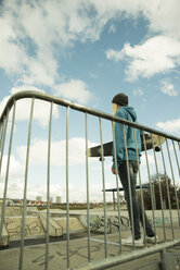 Germany, Mannheim, Young woman at skate park - UUF000025