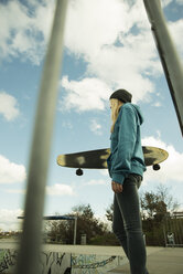 Germany, Mannheim, Young woman at skate park - UUF000026