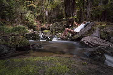 New Zealand, Whakapapa area, Tupapakurua falls, man lying on a brook - WV000552