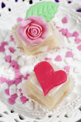 Two petit four and baking decor on cake stand - CSF021158