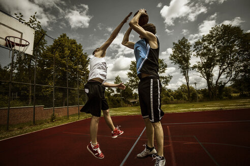 Two young basketball players at duel - GCF000019