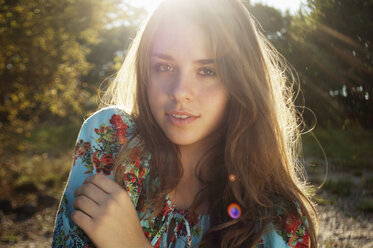 Portrait of female teenager at backlight - LFOF000175