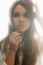 Portrait of female teenager with long brown hair - LFOF000181