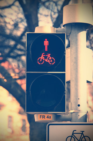 Germany, Lower Saxony, Hameln, pedestrian light and bicycle traffic signals stock photo