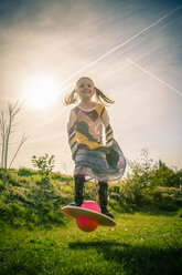 Little girl playing with Moon Hopper - SARF000439