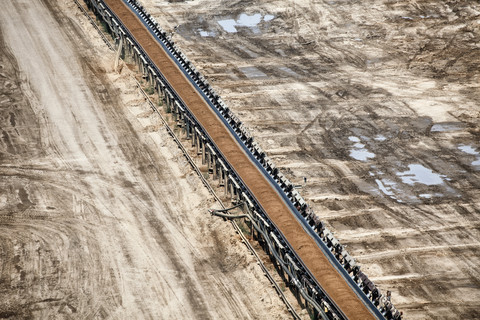 Germany, North Rhine-Westphalia, Garzweiler surface mine, Conveyor belt with coal stock photo