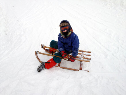 Germany, Bavaria, alps, Wallenberg, man on a sledge - TKF000329