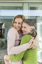 Senior mother and her daughter hugging - MFF000984