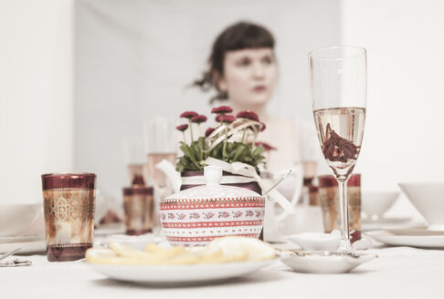Young woman on a retro style tea party - DISF000728