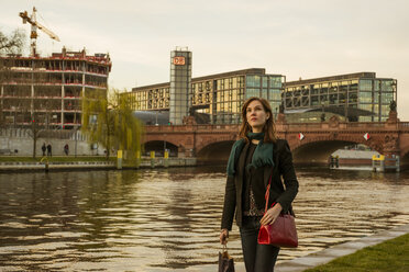 Germany, Berlin, female tourist on the move near central station - FBF000312