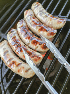 Bratwurst on the grill - ABAF001298