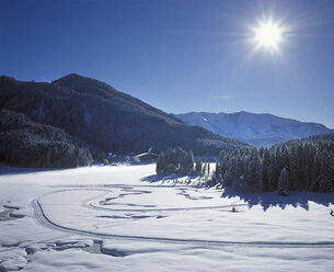 Germany, Bavaria, Upper Bavaria, Mangfall Mountains, cross-country ski run in the snow - SIEF005274