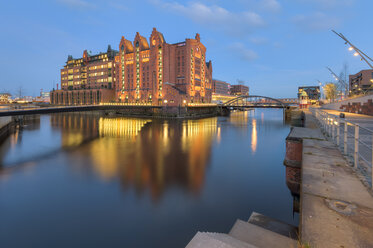 Germany, Hamburg, View of the International Maritime Museum at the Brooktorhafen after sunset - RJF000086