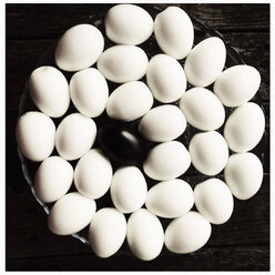Many peeled eggs, boiled eggs, one black egg - MSF003752
