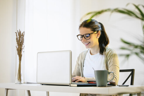 Woman working at modern home office - EBSF000189