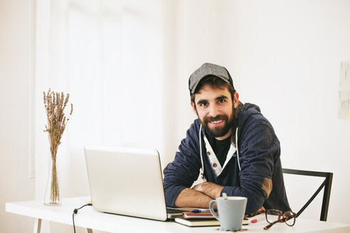 Portrait of man at modern home office - EBSF000176