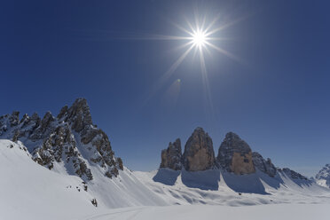 Italy, Alto Adige, Sexten Dolomites, Hochpuster Valley, Tre Cime di Lavaredo against the sun - GFF000434