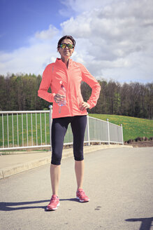 Portrait of female jogger having a break - VTF000210
