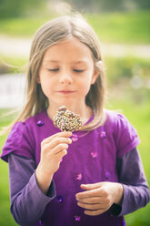 Portrait of little girl with cake pop - SARF000530