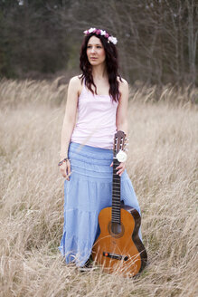 Germany, Young woman with guitar - AFF000052