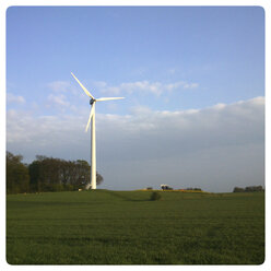 Germany, North Rhine-Westphalia, Petershagen, wind turbine in rural landscape near Petershagen. - HAWF000129