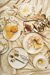 Variations of Italian almond cakes on laid coffee table - CSTF000281